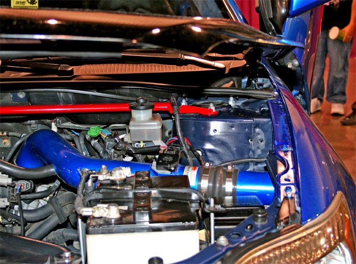 K&N air intake system in blue is a good color match for the 2006 Scion tC's 