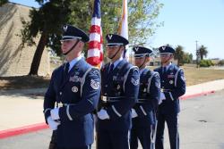 March Air Force Base Color Guard carrying the American flag and State flag of California