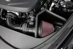 The heat shield takes the place of the factory air box and utilizes only existing fittings