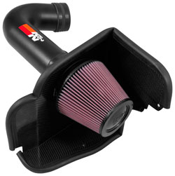 The carbon fiber heat shield blocks hot engine air from entering the intake tract