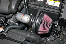 K&N powder coated its short ram intake system for 2014 Kia Forte and Kia Forte Koup 2.0L models in a silver color to protect the tube and look good under the hood