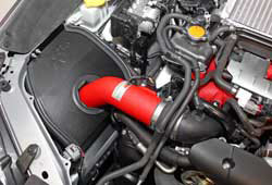 The K&N performance air intake for the 2015-2016 Subaru WRX STi positions the reusable K&N high-flow air filter in a location near the front of the car