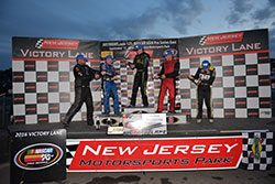 Noah Gragson, Justin Haley, Kyle Benjamin, Collin Cabre, and Dominique Van Wieringen on the podium at New Jersey Motorsports Park