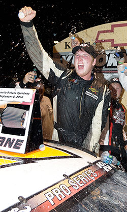 Austin Hill, a NASCAR Next driver, celebrates his first NASCAR K&N Pro Series East win of the 2014 season at Greenville Pickens Speedway giving Hill two NKNPSE career victories