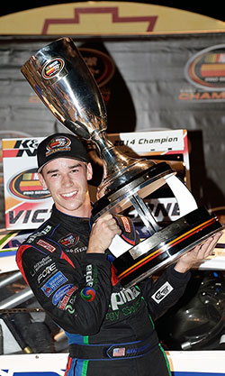 Ben Rhodes fought his way up to fourth place after a violation on the initial race start and secured the NASCAR K&N Pro Series East championship title with one race still remaining in 2014