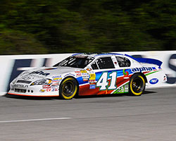 The Alpha Energy Solutions Chevrolet Impala, driven by Ben Rhodes, led 50 laps and won the race at Five Flags Speedway with a .985 second margin over second place