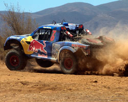 The SCORE-International Baja 500 race is tough on man and machine. The Red Bull Trophy Truck of Menzies Motorsports suffered a flat tire after only 100 miles