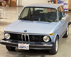 K&N has partnered with the Clarion Builds program and is moving forward with the complete restoration and modernization of this 1974 BMW 2002