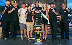 A representative from K&N and Miss Evergreen Speedway presented the MMI Services/Ron’s Rear End Chevy race team with a trophy for their NASCAR K&N Pro Series West race win