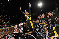 Chris Eggleston celebrates after winning the NASCAR K&N Pro Series West race