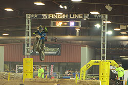 Colton Haaker crossing the finish line at Endurocross round 4 in Scottsdale, Arizona