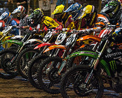 Geico Motorcycle EnduroCross races begin with riders lining up behind a gate, just as they do in Supercross
