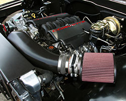 A Chevrolet 5.7-liter LS1 engine breathing through a K&N air filter and custom intake tube powers the 1969 Chevy C10 truck by Creations N’ Chrome