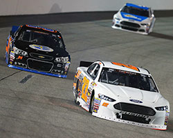 Austin Hill overtakes William Byron at the UNOH 100 NASCAR K&N Pro Series East race at Richmond