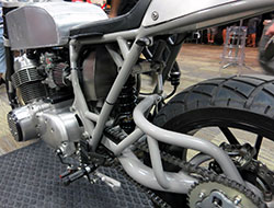 Custom single sided swing arm on Gasser Customs motorcycle