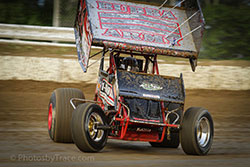 Tyler Clem’s midget sprint appears to be moving sideways as it takes on the dirt track.