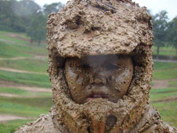 Team member Max Haefker clearly enjoys the mud over video games.