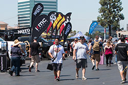 Fans walking by K&N booth at Auto Enthusiast Day