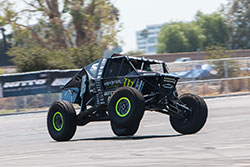 Cody Curry on three wheels at Auto Enthusiast Day