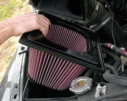 K&N air filter being installed into vehicle