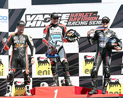 Just four days after knee surgery K&N sponsored XR1200 racer Kyle Wyman stands on the AMA Pro Vance & Hines Harley-Davidson Series podium in third behind Steve Rapp and Danny Eslick