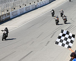 Wyman lost some ground on the Vance & Hines Harley-Davidson race leaders Steve Rapp and Danny Eslick but crossed the finish line at Laguna Seca a good distance in front of the pack