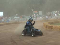 Lawnmower Racer David Lewis with Checkered Flag