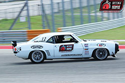 Jake Rozelle driving his 1969 Chevrolet Camaro at Circuit of the Americas