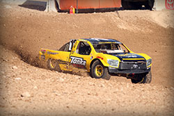 Throwing some dirt with the Tonka Truck.