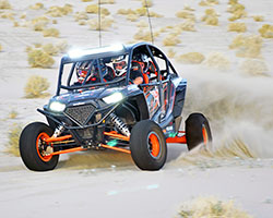 The 2014 Polaris RZR XP 4 1000 boasts 107 horsepower and seating for four sand dune fanatics