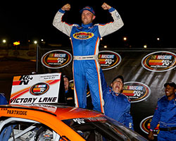 NASCAR K&N Pro Series West rookie Ryan Partridge turned a dominant performance at Colorado National Speedway into his first career NASCAR K&N Pro Series West victory