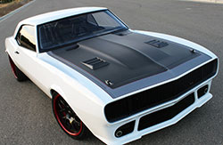 Body modifications to this ’67 Camaro include a custom front valance and front fenders with EBMC air induction to aid engine cooling and provide fresh air to a pair of K&N air filters