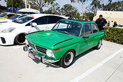 green BMW 2002 at Shutter Space Randy Higbee Gallery, Costa Mesa, California sponsored by Crooks & Castles and Super Street