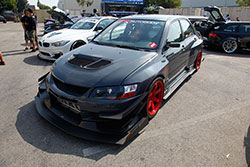 2006 Lancer Evo IX with a Voltex body kit at Shutter Space Randy Higbee Gallery, Costa Mesa, California sponsored by Crooks & Castles and Super Street