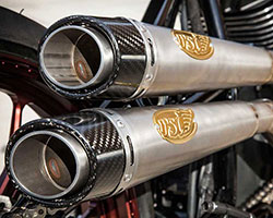 Exhaust for the Track Chief was constructed from carefully mandrel bent titanium tubing with the goal of keeping the pipes as close to the chassis as possible without sacrificing leg room