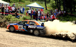 Comrie-Picard and co-driver Jeremy Wimpey, driving in their NOS Energy Mitsubishi Evolution