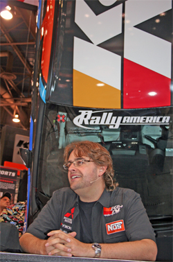 Rally Racer Andrew Comrie-Picard at K&N booth at SEMA in Las Vegas, Nevada