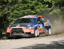 Racer Andrew Comrie-Picard in Mitsubishi Lancer Evolution X at Canada's Rallye Defi Ste-Agathe, photo by onalimbracing.com