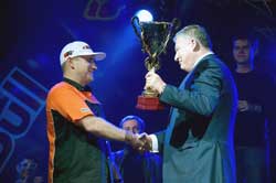 Aleksandr Grinchuk is presented his third consecutive Drift King trophy by the president of the Federation of Autosport of Ukraine (FAU).