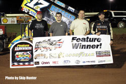 Despite a broken rocker arm during the hot laps, Bill Balog recently took the checkered flag in the main event while competing in the Horsepower Half-Mile, at the Dodge County Fairgrounds, in Beaver Dam Wisconsin.