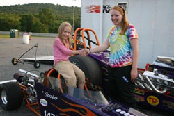With a simple handshake Heather bestows the Junior Dragster to youngest sister and newest team member Amber.