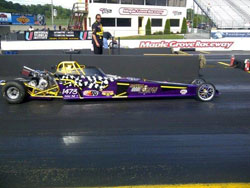 Amber loves racing her new car with its Mountain Valley Customs paint job at Maple Grove Raceway.