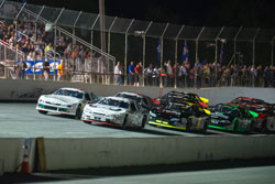 Ben Kennedy and Gray Gaulding lead the pack during K&N Pro Series East race at Five Flags Speedway