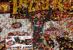 Ben Rhodes celebrates winning the NASCAR K&N Pro Series East at the Iowa Speedway
