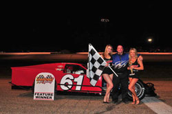 Brad Springer enjoys the spoils of victory after his recent Modified win at Springport Motor Speedway.