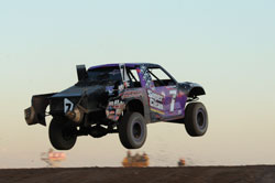 Bryce Menzies and his off-road truck catching some air.