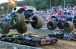 Black Stallion and Iron Warrior Monster trucks compete in match racing at Lebanon County Fair in Pennsylvania, photo by Marie Brennan