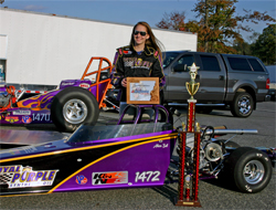 Allison Bell and her Junior Dragster Trophy at Maple Grove Raceway in Mohnton, Pennsylvaniay
