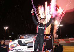 Cameron Hayley celebrating his win at the All American Speedway in Roseville, CA