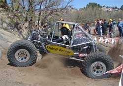 Team Waggoner revs up its engine and spits dirt everywhere trying to get in line for a climb at Cedar City, Utah
